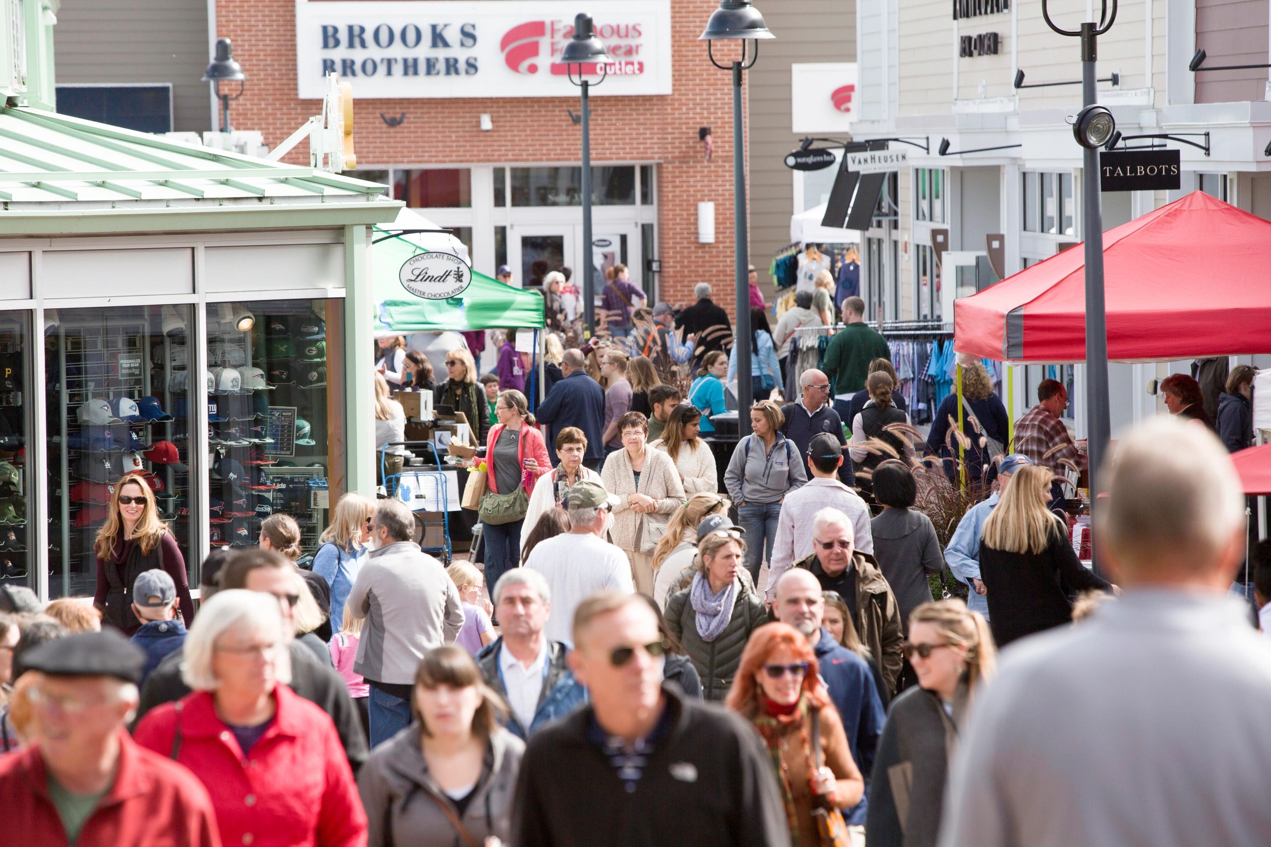 Shoppers at Freeport Village Station, a PRISM-managed retail center